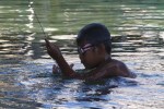 Bajau boy with speargun, Sanpela, Wakatobi,&nbsp;Indonesia