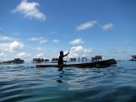 Paddling Through the Village – Bajau Laut Man outside of Bodgaya, Semporna,&nbsp;Malaysia